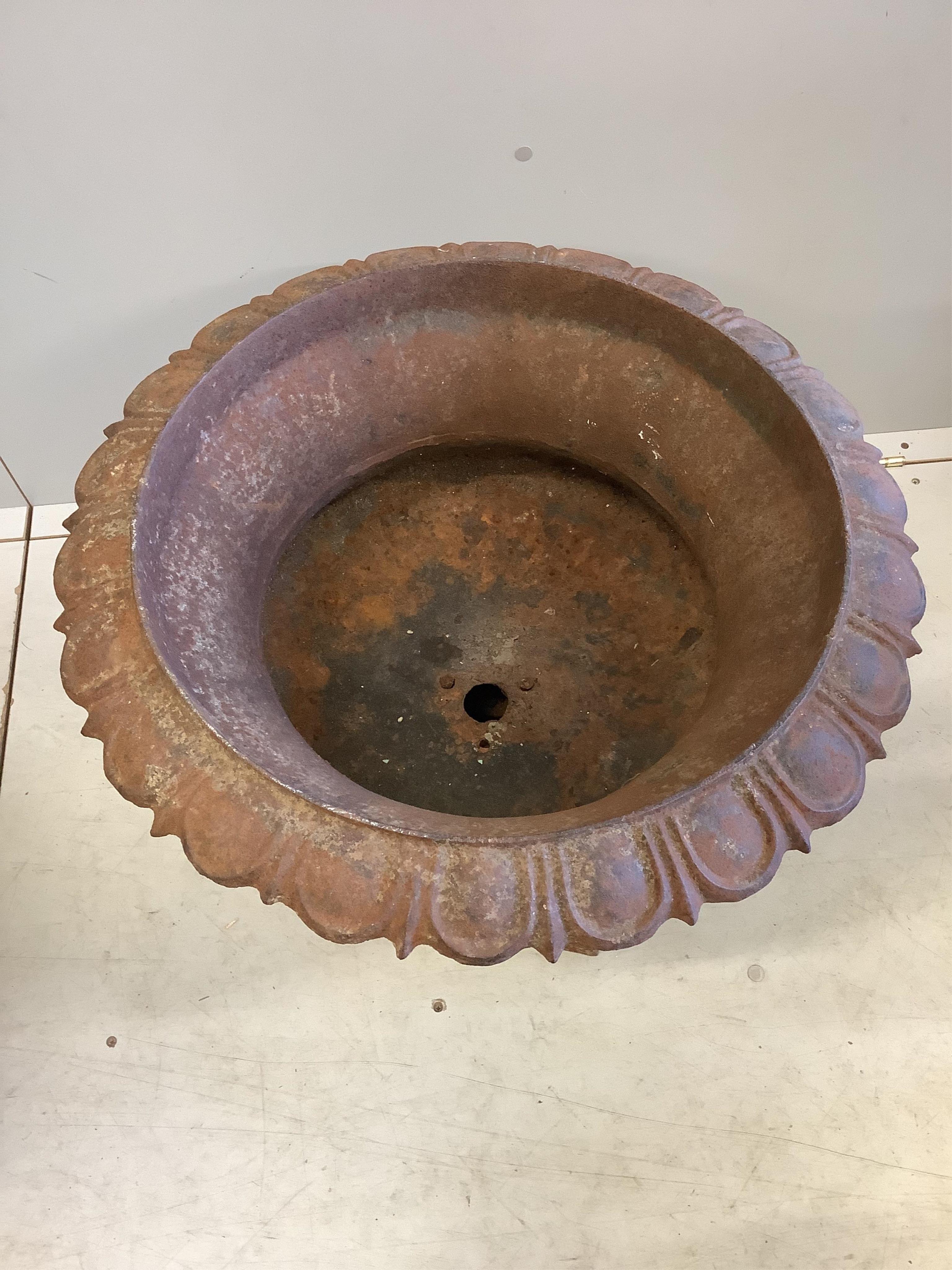 A pair of Victorian cast iron campana garden urns, diameter 60cm, height 53cm